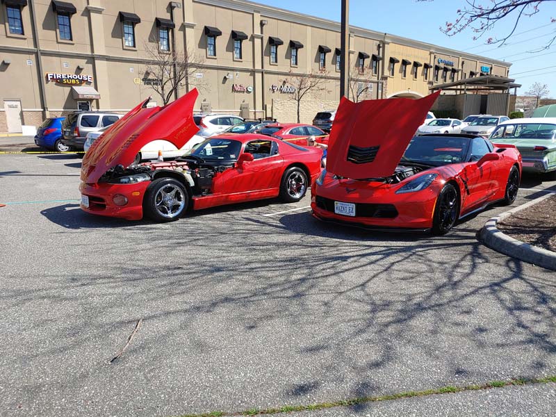 2 Red Corvettes